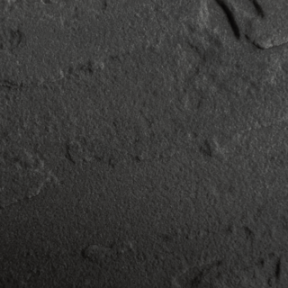 SPALTRAU Nahaufnahme von Tundra Sandstein mit spaltrauer Oberfläche